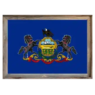 Framed Pennsylvania state flag with blue field and full coat‑of‑arms in a rustic reclaimed‑wood frame.