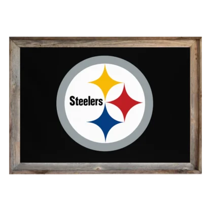 Framed Pittsburgh Steelers flag displaying black field with circular logo and yellow, red, blue hypocycloids, set in rustic light‑wood frame